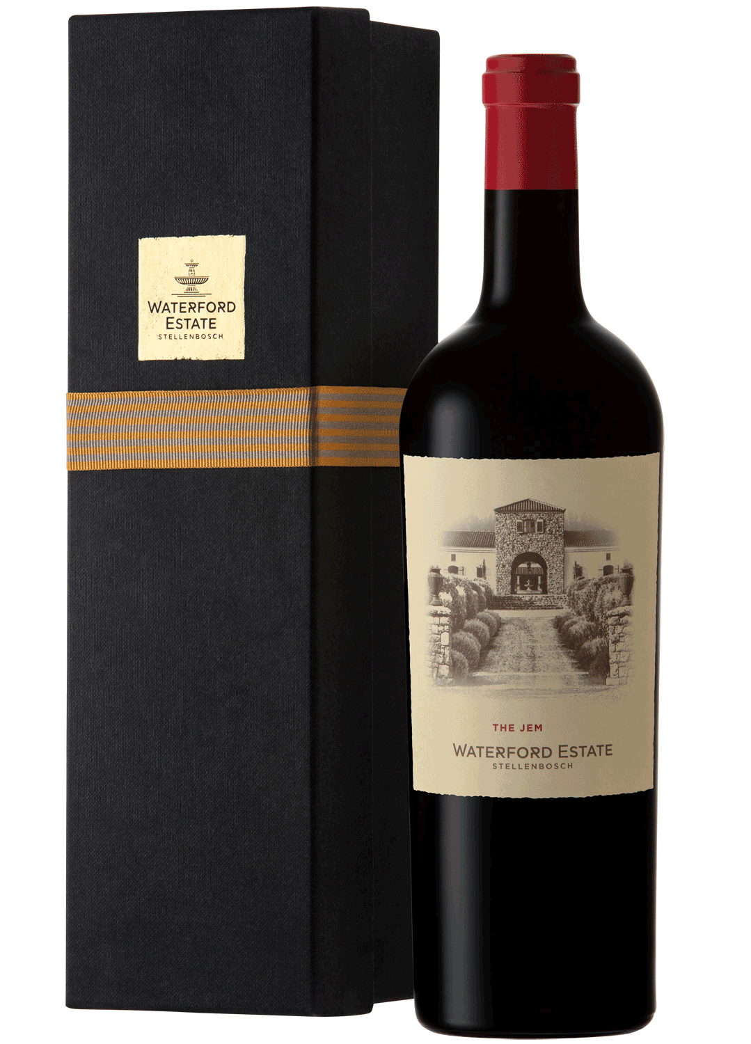 Eine Flasche Waterford Estate Rotwein mit rotem Verschluss steht neben einem schwarzen Geschenkkarton mit goldenem Etikett und goldener horizontaler Schleife. Das Weinetikett zeigt die Illustration eines Steingebäudes und die Aufschrift "The Jem, Waterfo